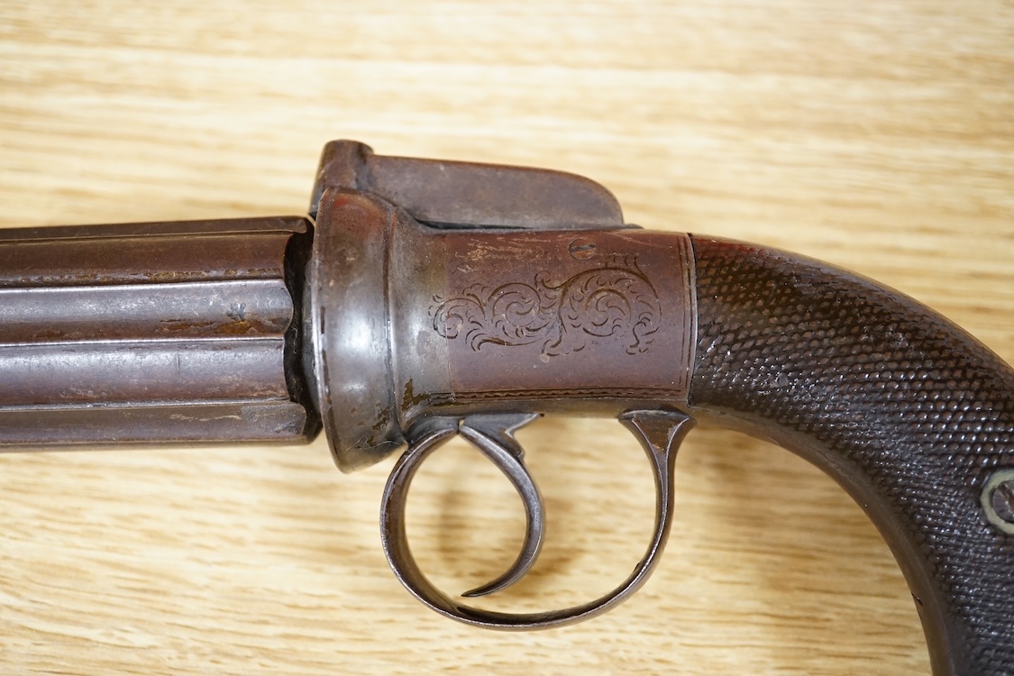 A six shot 120 bore self-cocking percussion pepperbox revolver with fluted barrels, Birmingham proof, rounded foliate engraved frame, and two-piece chequered walnut grips